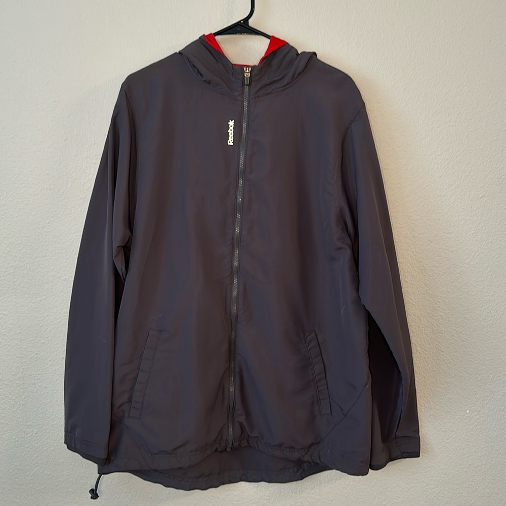Grey Reebok windbreaker